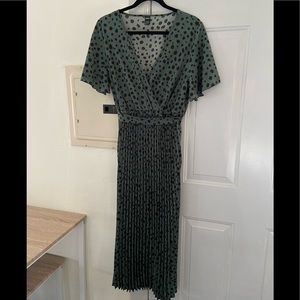 Pok a dot dark green dress
